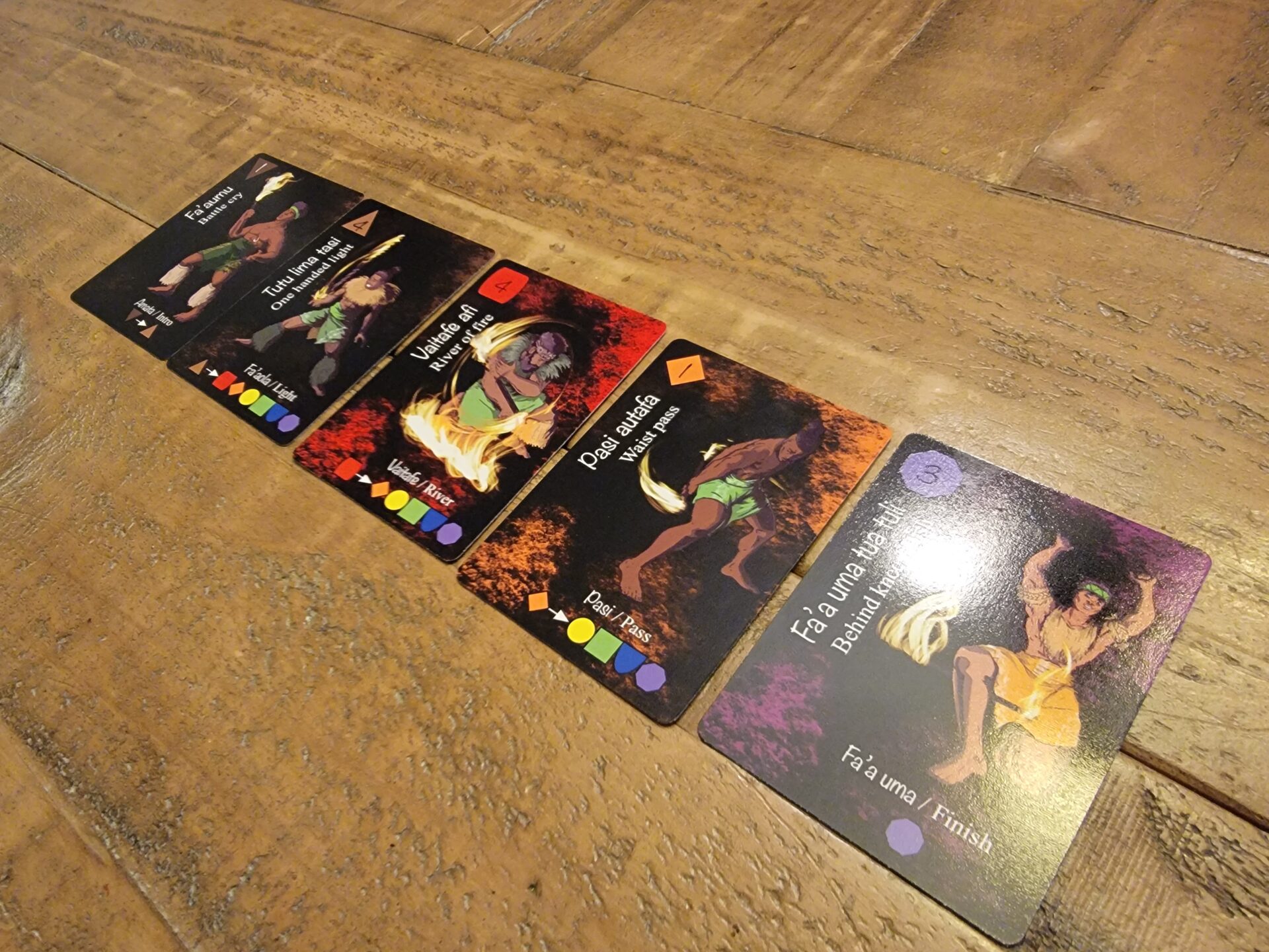 Siva Afi board game cards with firedancers