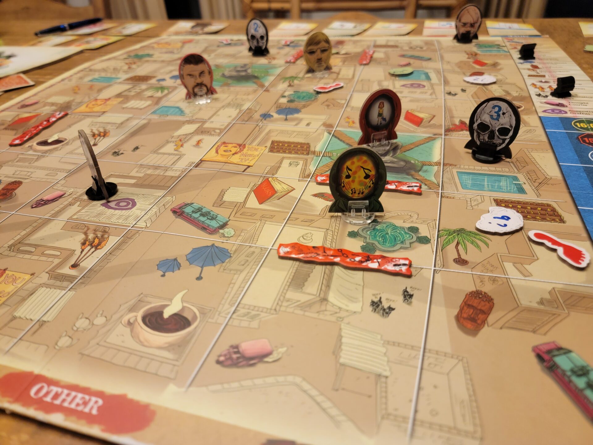 Mind MGMT board game being played on a table.