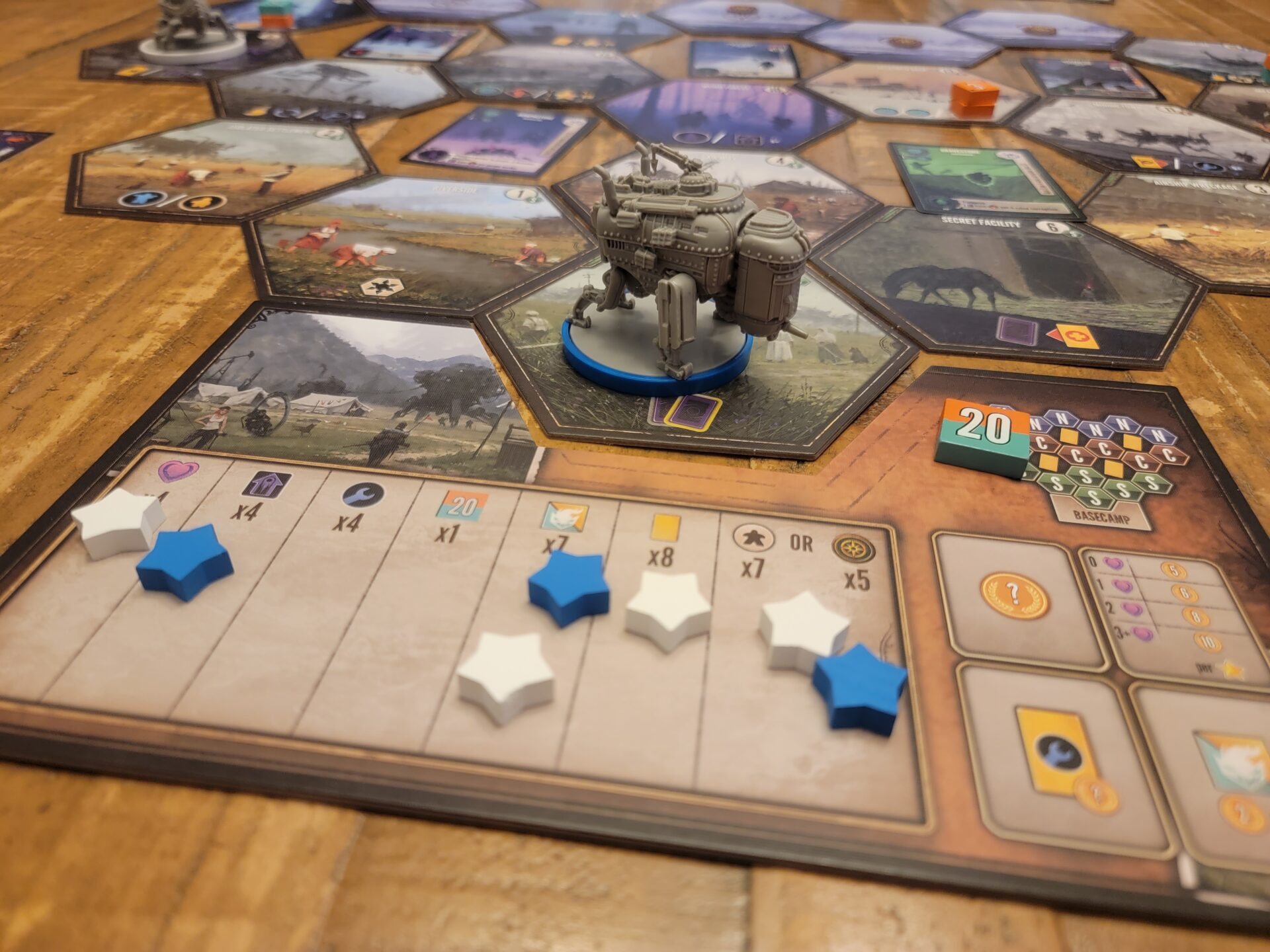 Expeditions player board on a table during the game.