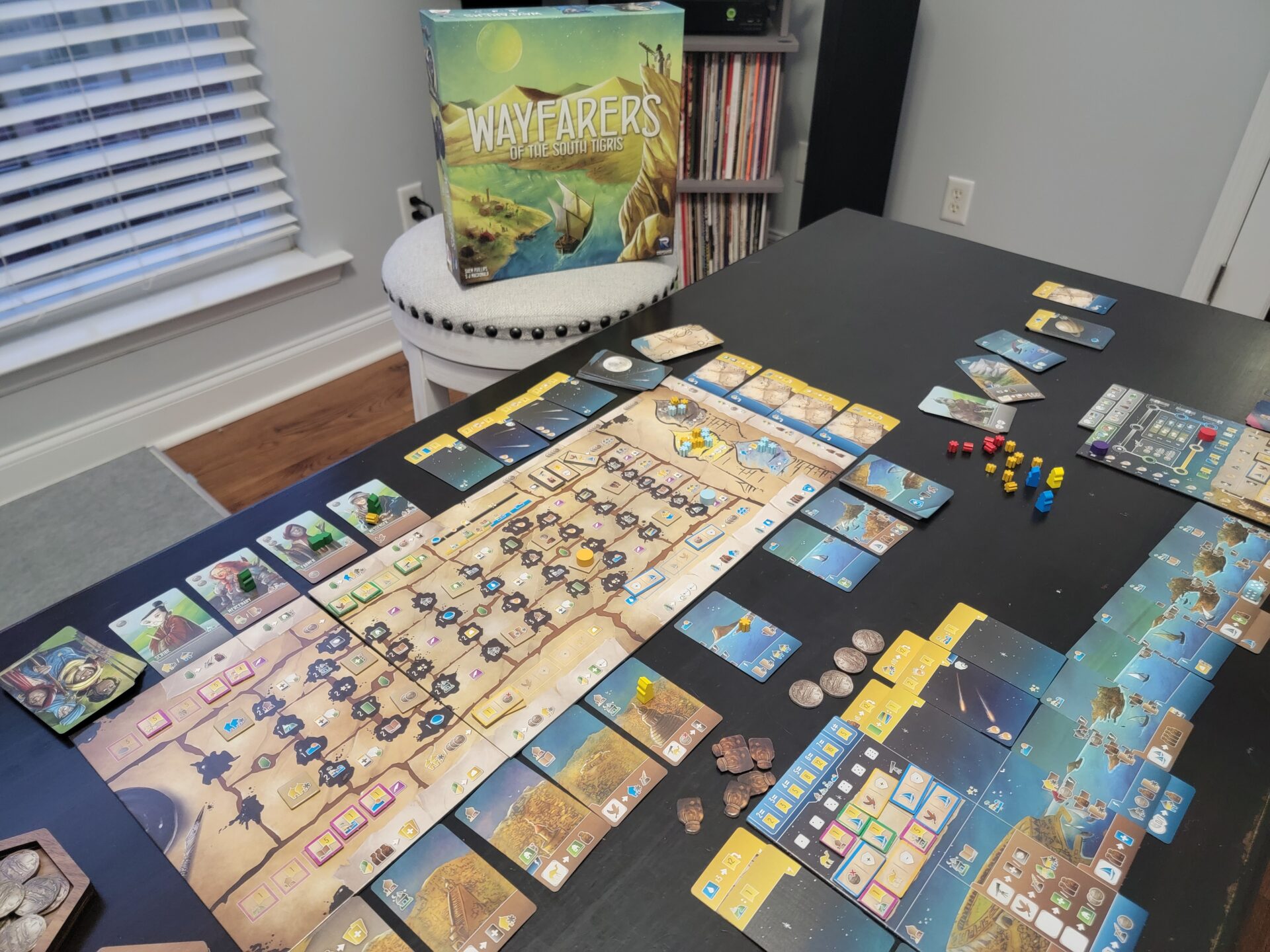Wayfarers of the South Tigris board game being played on a table.